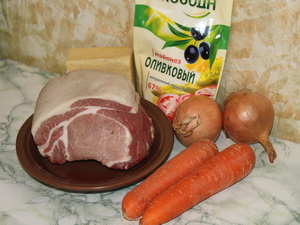 Свинина, запеченная с луком и морковью по-запорожски